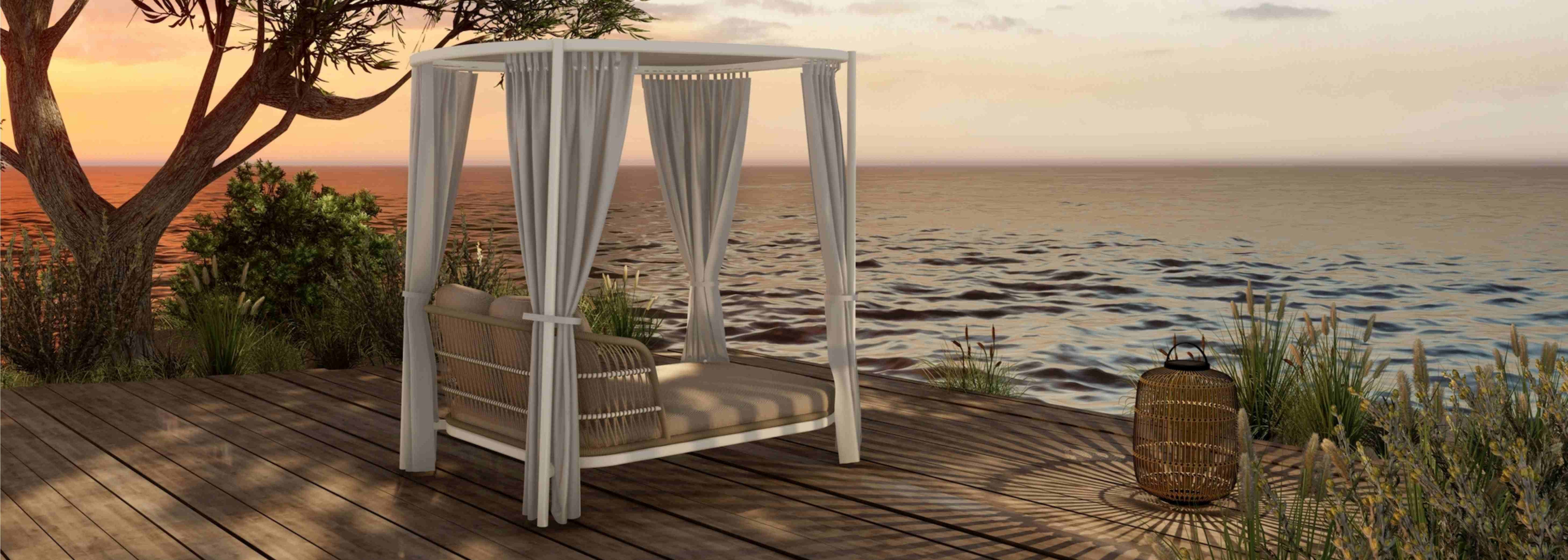 Luxuriöses Benito Daybed am Wasser mit Vorhang